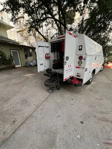 Magnet Plumbing service vehicle on-site for Grease Trap Cleaning in Venice Edgewood